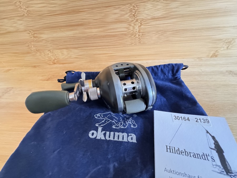 Multirolle & Baitcaster,  Okuma, V-System,  V-200LXa  10 Bearings, Linkshand, Rollenbeutel, minimale Gebrauchsspuren