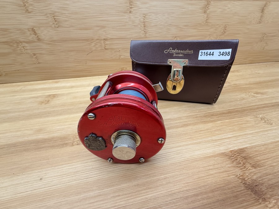 Multirolle, ABU Urfabriken Sangsta Sweden, ABU Ambassadeur No 5000, 512256, Lederbox, mit Monofiler Schnur, Gebrauchsspuren