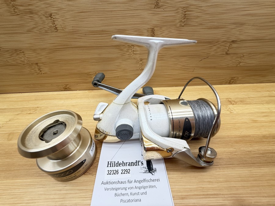 Stationärrolle, Shimano, Japan, Stratic, 4000FG, mit geflochtener Schnur, Reservespule, Gebrauchsspuren